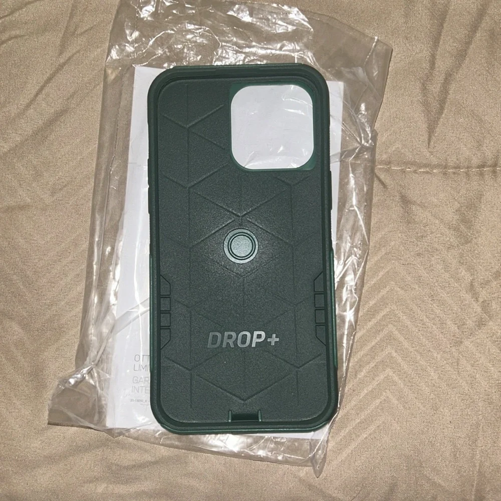 Otterbox commuter series case for iPhone 14 Pro Max Green Pro Max brand new.